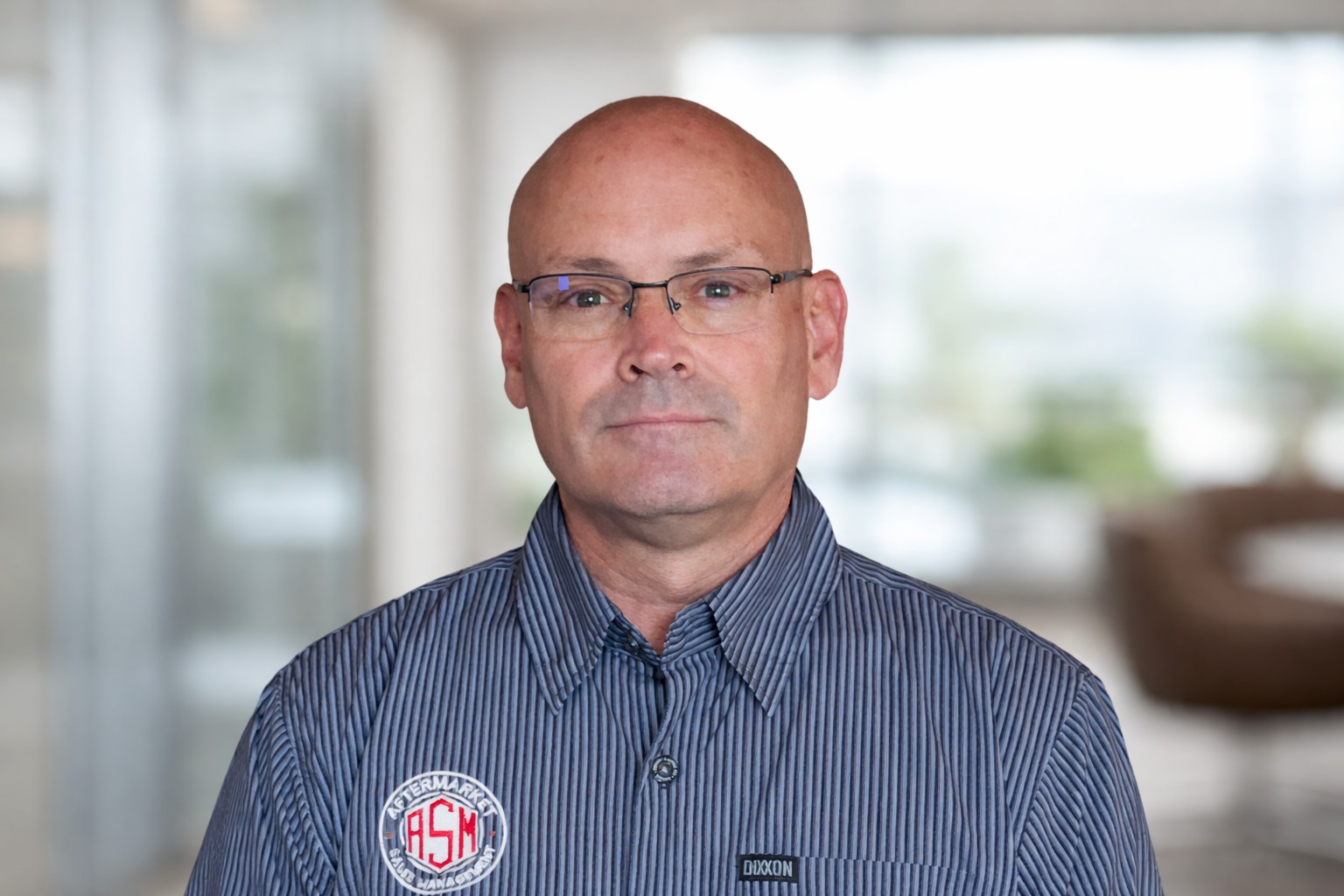 Kirk Abegglen wearing an Aftermarket Sales Management shirt